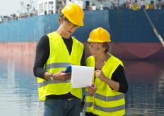Companies may also have an interest in an overseas sourcing agent. In this case, they rely on the agent to locate companies they can work with overseas. The sourcing agent's job includes assessing the needs of the company, locating suppliers, and meeting them to see if they will be able to take on the orders. She can inspect factories to confirm that they will be able to meet standards. This can also include evaluations to address ethical concerns like worries about pollution or exploitative labor conditions.  The overseas sourcing agent can also deal with issues like import/export duties, tariffs, and taxes. These can be challenging for companies not familiar with the norms in a given nation to handle. The agent's skills can cut down on expenses and also move goods through shipment more quickly, with less risk of a holdup at some point along the supply chain. In regions where corruption can complicate business negotiations, a local sourcing agent familiar with the community and the traditions can cut through red tape quickly and efficiently.  Companies can locate sourcing agents in a number of ways. Some advertise themselves or work for sourcing firms. They may attend trade shows and other events to meet with prospective clients. They often bring samples of the kinds of supplies they can acquire for the benefit of prospective customers. They may also register with trade associations and government offices so company representatives seeking directories of sourcing agents from reliable authorities will get their names first.